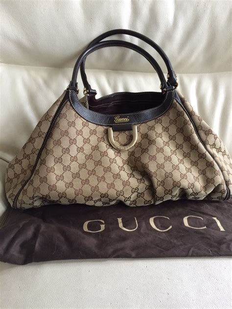 precio de bolsa gucci original|bolsos gucci outlet.